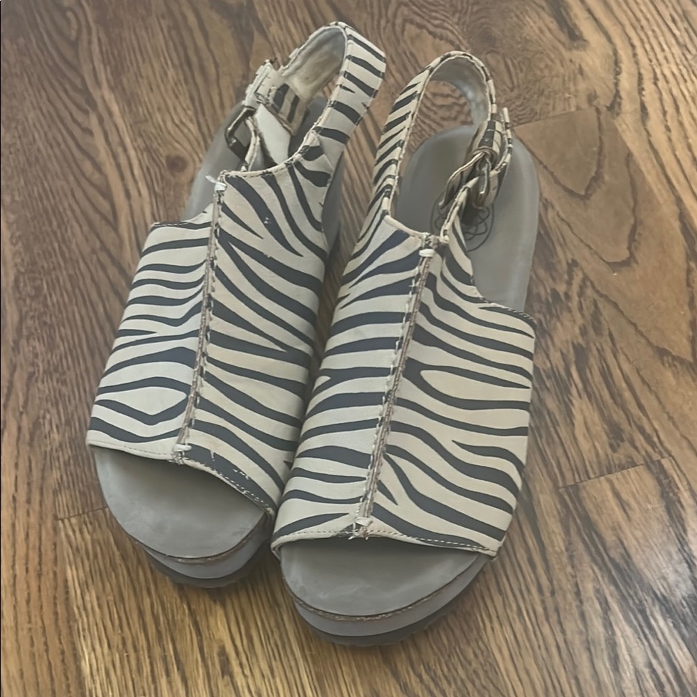 Cream and Black Sandals with Zebra Pattern and Slingback Design